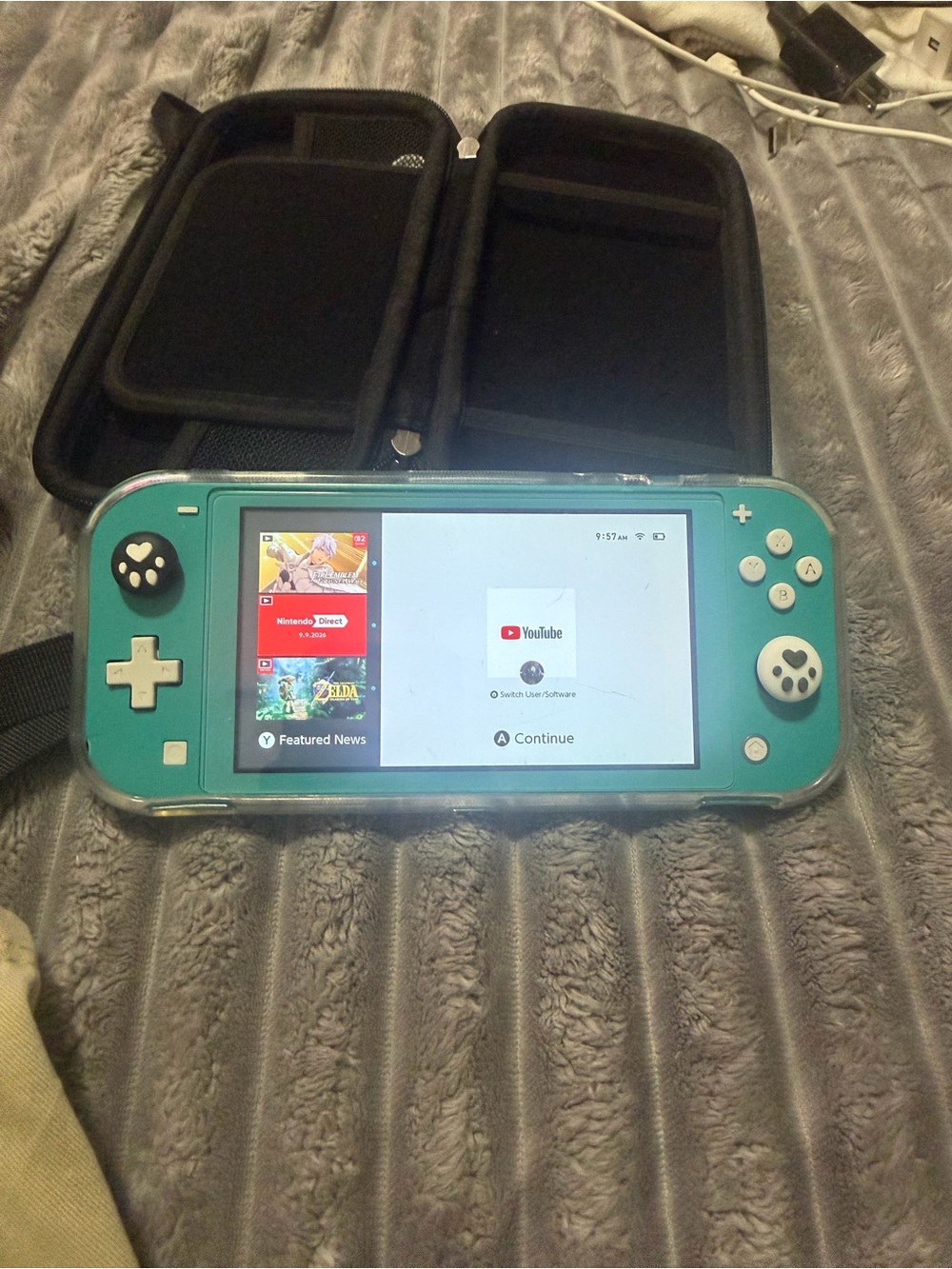 Nintendo Switch Lite Turquoise Handheld Console with Screen On